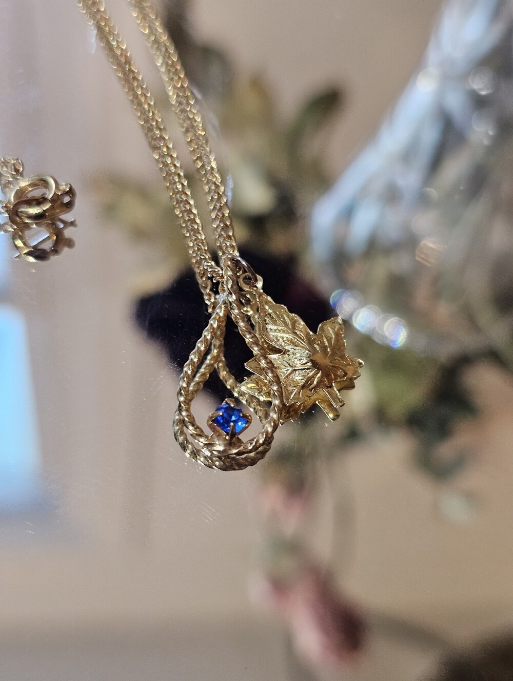Vintage Charm Gold Leaf Pendant Necklace with Blue Accent